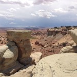 A view of the desert from atop a mountain.